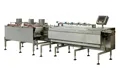 Ligne automatique d’alimentation et d’emballage